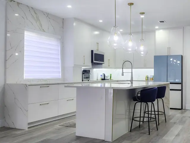 White kitchen with gold handles
